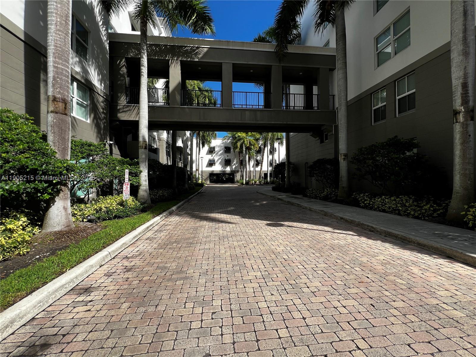 2421 Northeast 65th Street, Unit 506 Fort Lauderdale, FL 33308 - Photo 55 of 59 a view of house with outdoor space and street view