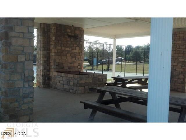0 Mallard Lane Locust Grove, GA 30248 - Photo 14 of 27 a kitchen view with table and chairs