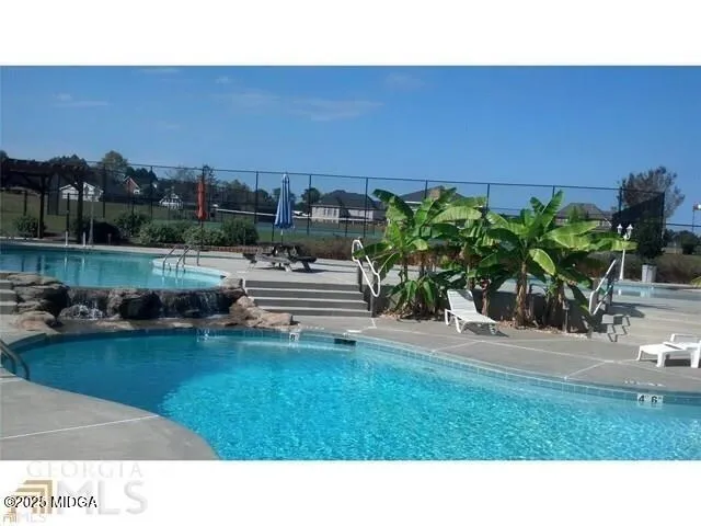 a black and white photo of a bench
