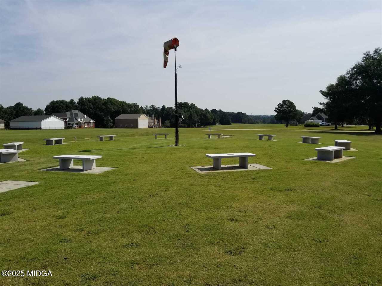 0 Mallard Lane Locust Grove, GA 30248 - Photo 22 of 27 a view of a golf course with a lake view