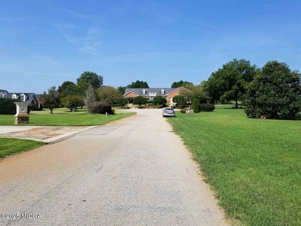 0 Mallard Lane Locust Grove, GA 30248 - Photo 5 of 27 a backyard with a garden and entertaining space