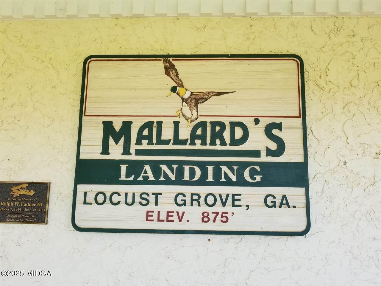 0 Mallard Lane Locust Grove, GA 30248 - Photo 6 of 27 a close up of a street sign