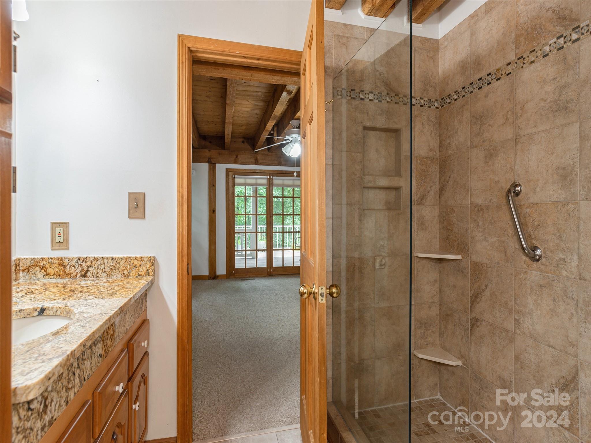 28 Chestnut Ridge Road, Unit 228 Mills River, NC 28759 - Photo 21 of 48 a bathroom with a shower and a sink