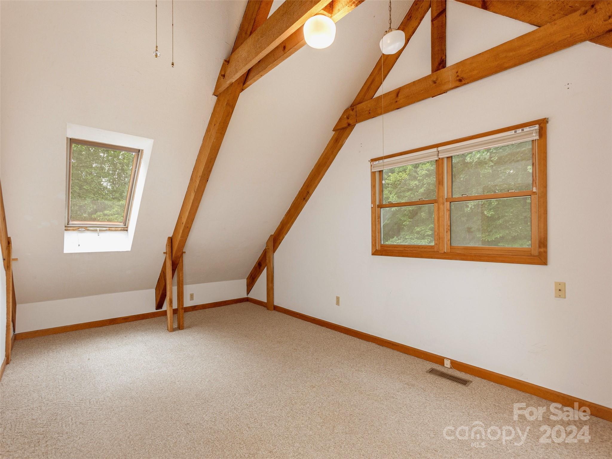 28 Chestnut Ridge Road, Unit 228 Mills River, NC 28759 - Photo 26 of 48 a view of an empty room with a window