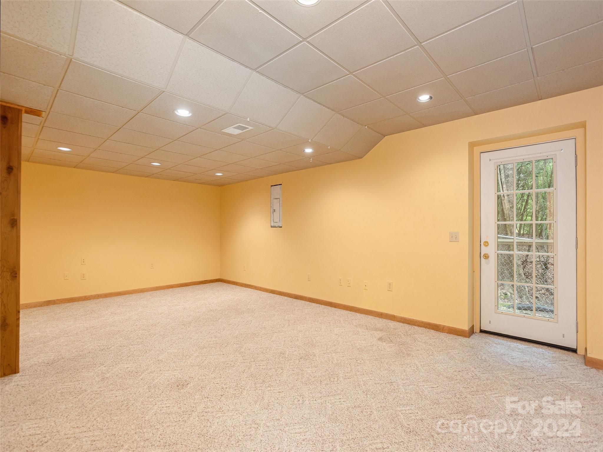 28 Chestnut Ridge Road, Unit 228 Mills River, NC 28759 - Photo 27 of 48 a view of an empty room with a window