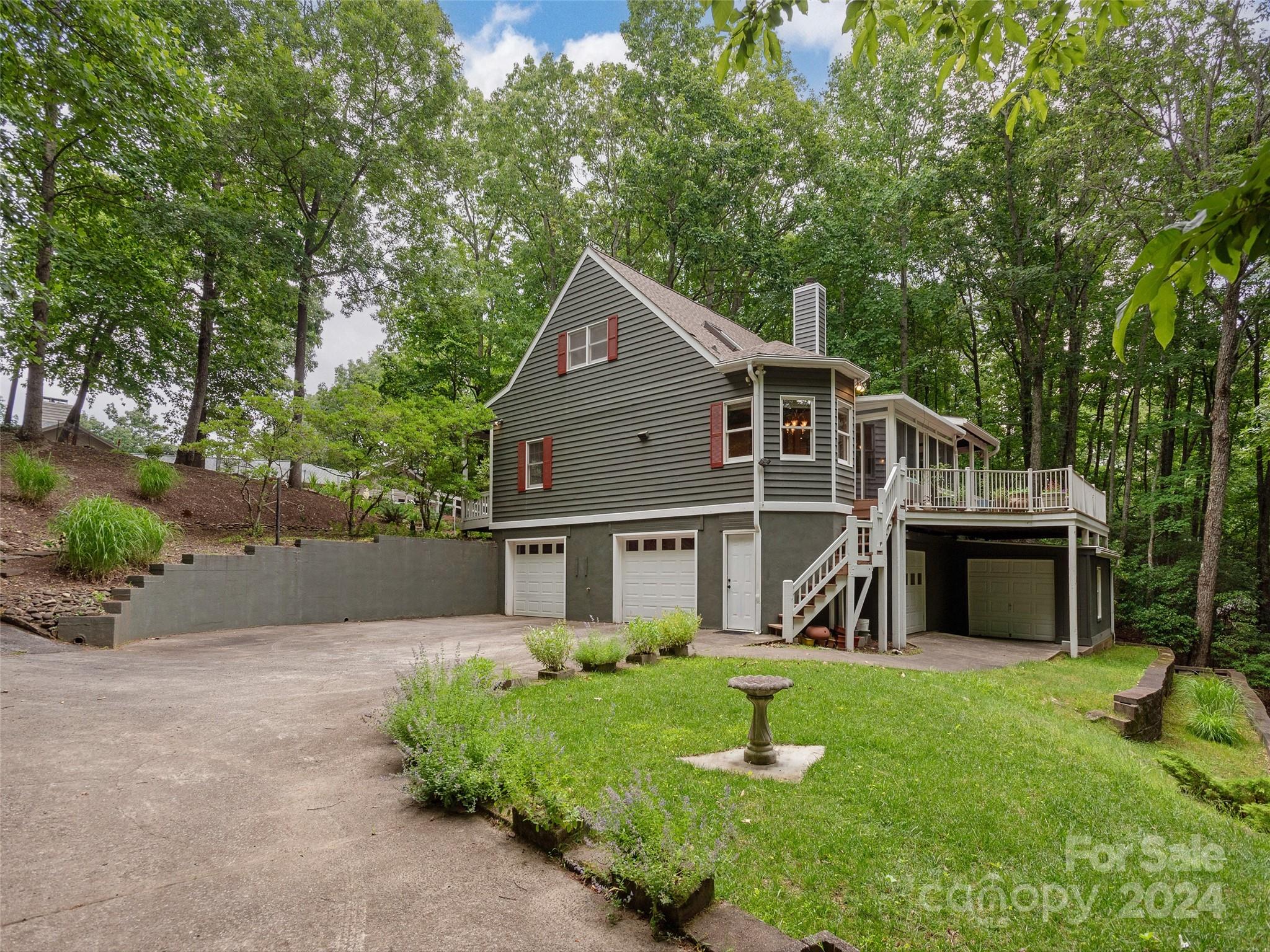 28 Chestnut Ridge Road, Unit 228 Mills River, NC 28759 - Photo 33 of 48 a front view of a house with a yard