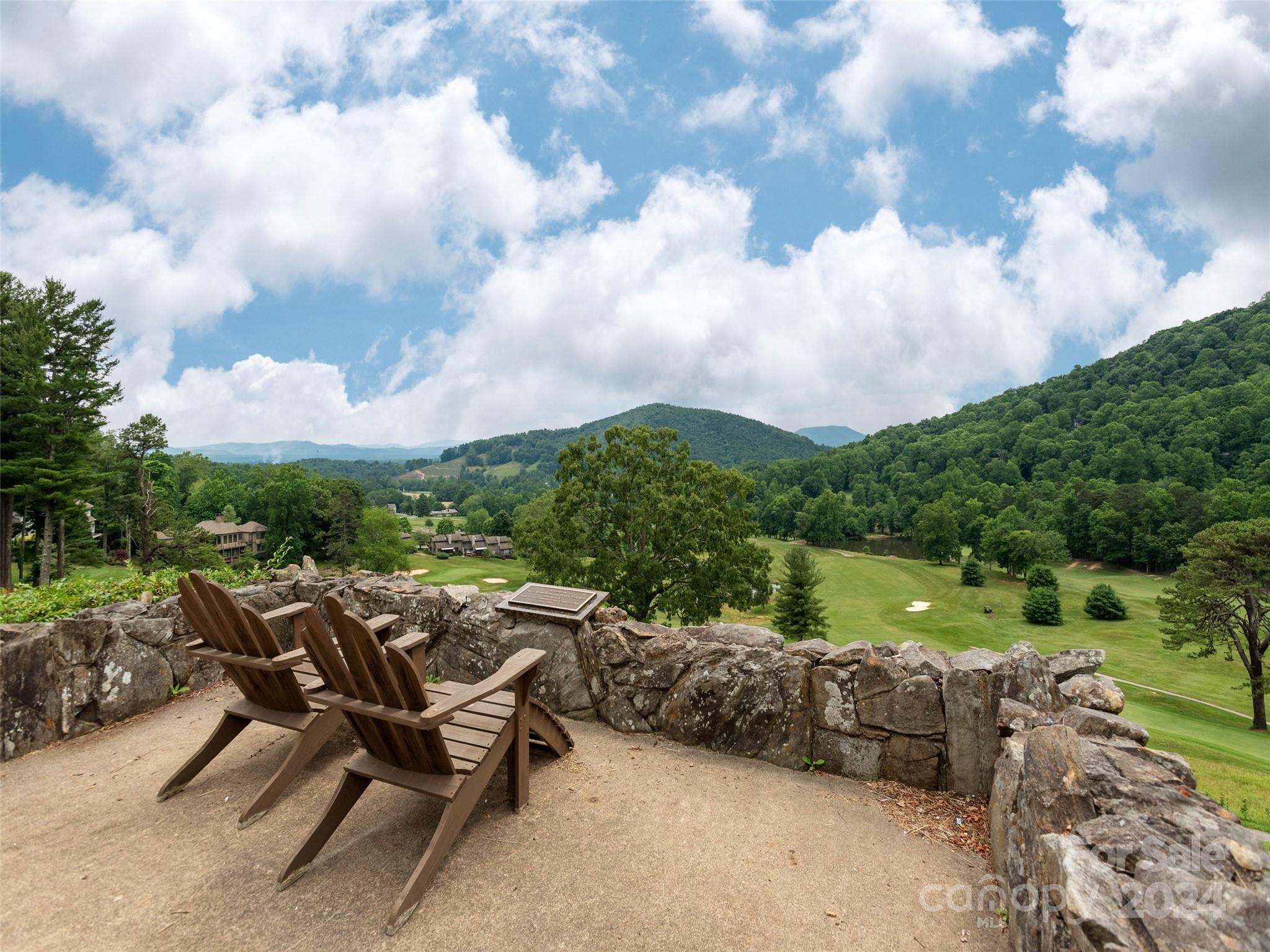 28 Chestnut Ridge Road, Unit 228 Mills River, NC 28759 - Photo 40 of 48 a view of a terrace with outdoor seating