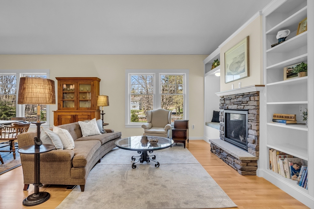 17 Whitney Road Stow, MA 01775 - Photo 14 of 42 a living room with furniture and a fireplace