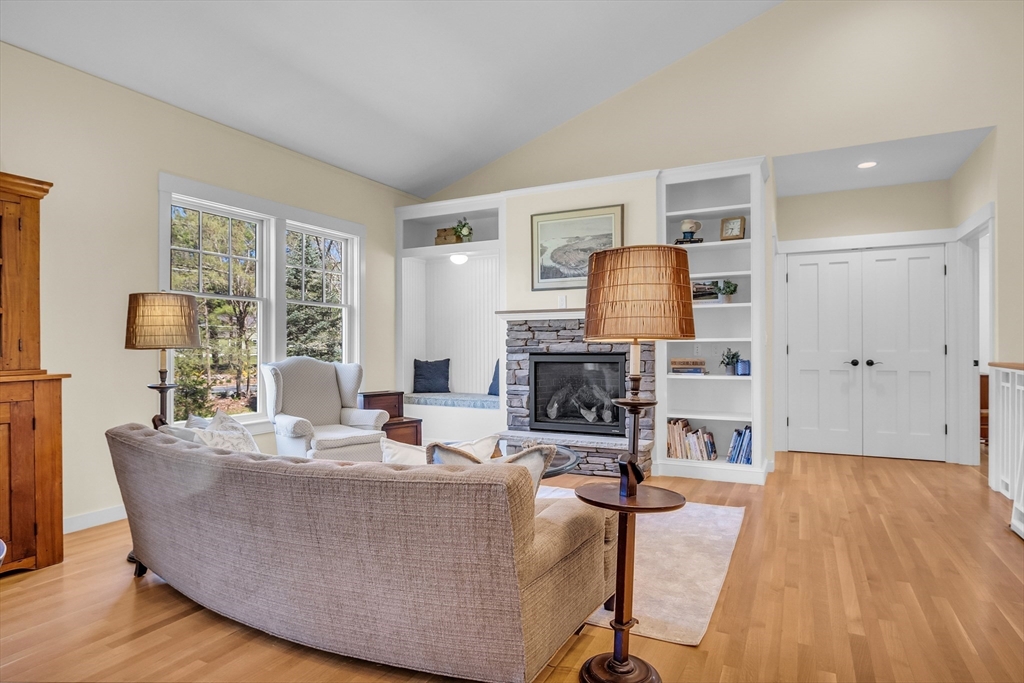 17 Whitney Road Stow, MA 01775 - Photo 15 of 42 a living room with furniture and a fireplace