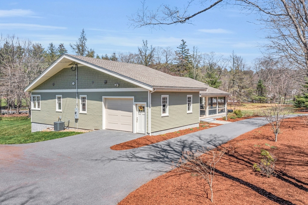 17 Whitney Road Stow, MA 01775 - Photo 2 of 42 a front view of a house with a yard