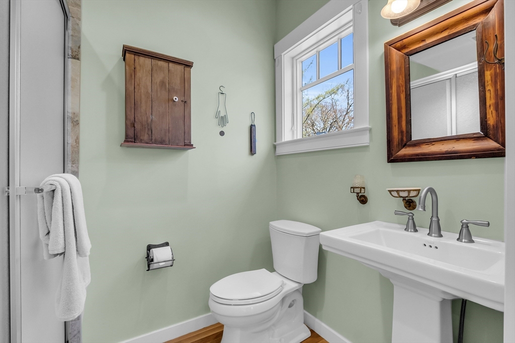 17 Whitney Road Stow, MA 01775 - Photo 25 of 42 a bathroom with a toilet a sink and mirror