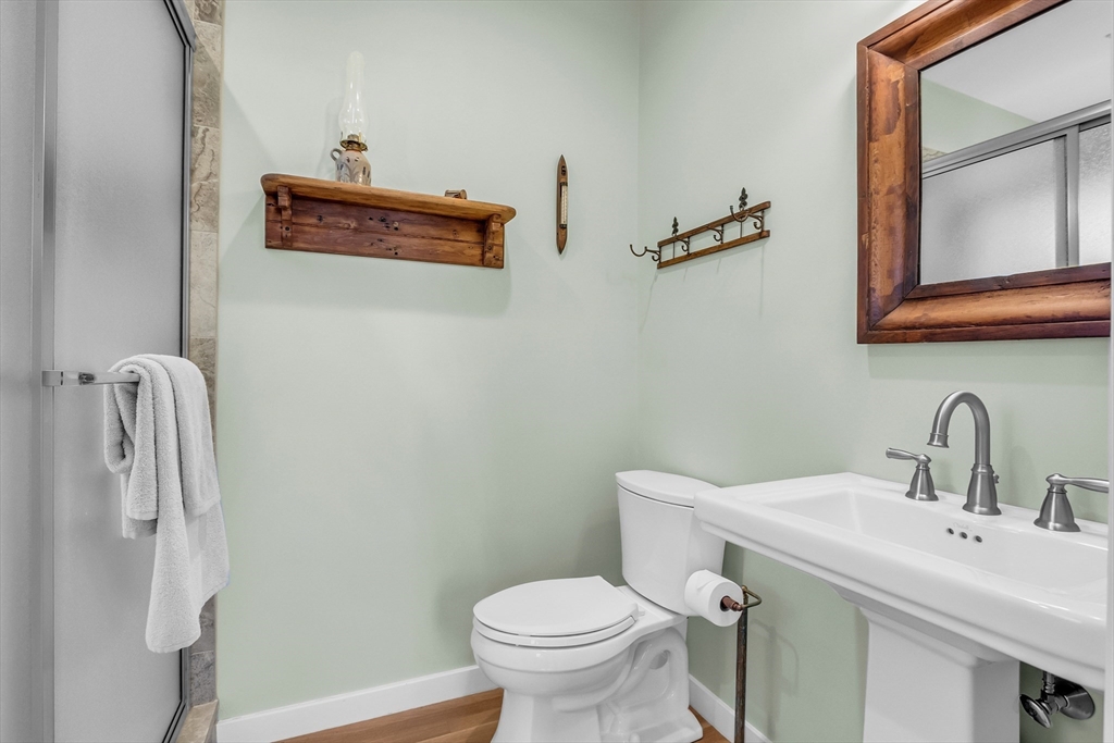17 Whitney Road Stow, MA 01775 - Photo 28 of 42 a bathroom with a toilet sink and mirror