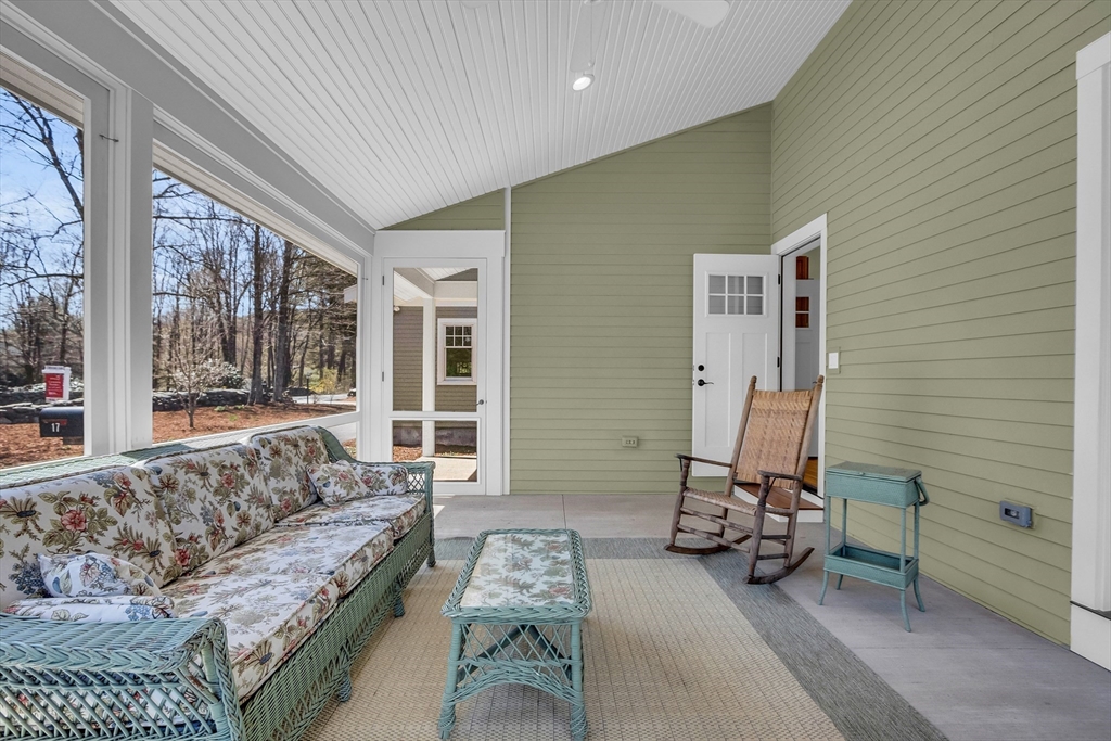 17 Whitney Road Stow, MA 01775 - Photo 29 of 42 a living room with furniture and a large window
