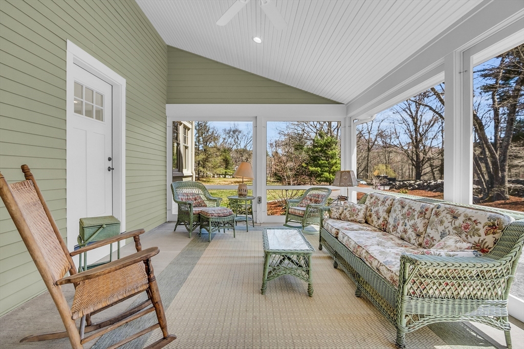 17 Whitney Road Stow, MA 01775 - Photo 30 of 42 a living room with furniture and a large window