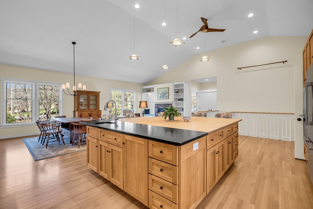17 Whitney Road Stow, MA 01775 - Photo 10 of 42 a kitchen with counter top space sink and center island