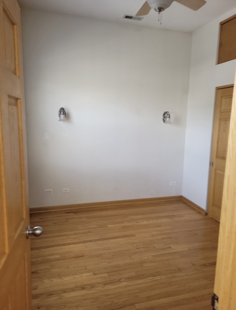 2350 West Grand Avenue Chicago, IL 60612 - Photo 7 of 8 wooden floor in a bathroom