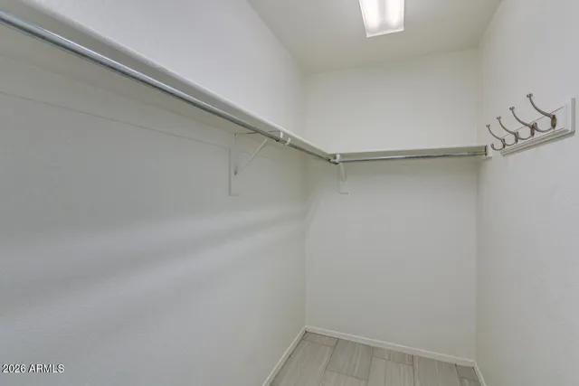 a view of a room with racks on the wall