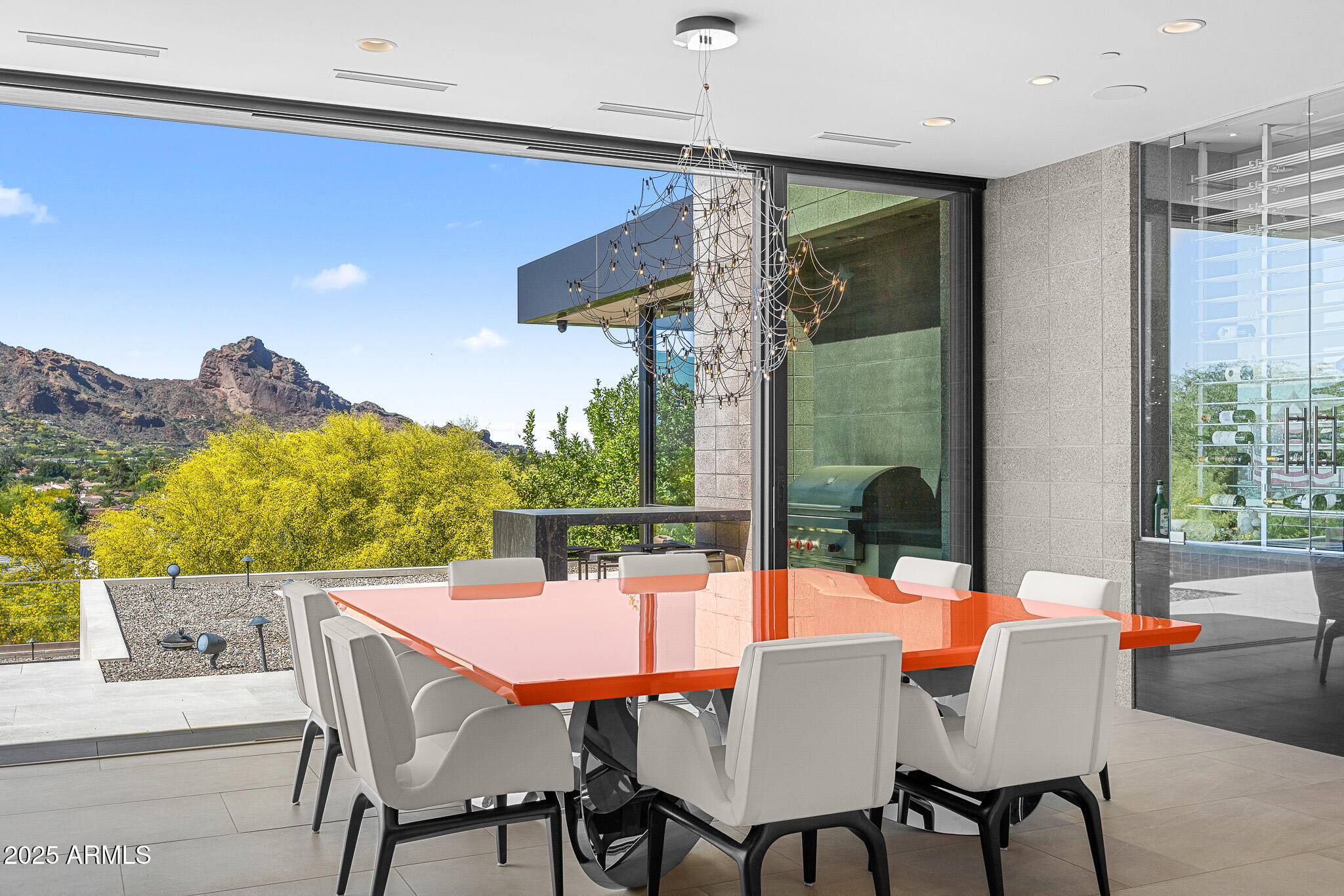 6149 East Indian Bend Road Paradise Valley, AZ 85253 - Photo 11 of 77 a view of an outdoor dining space with a table and chairs