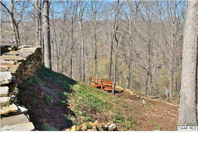 3080 Darby Road, Unit P2A33 Keswick, VA 22947 - Photo 30 of 32 Privacy, views & comfortable elegance. Restful sitting area to take in the wooded views and serenity of this tremendous Darby Road lot.