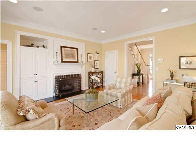 3080 Darby Road, Unit P2A33 Keswick, VA 22947 - Photo 7 of 32 Custom built media cabinet and mantel. Masonry fireplace with gas logs.