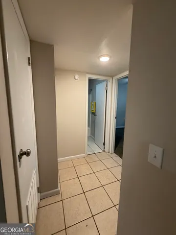 a bathroom with a toilet a sink and shower