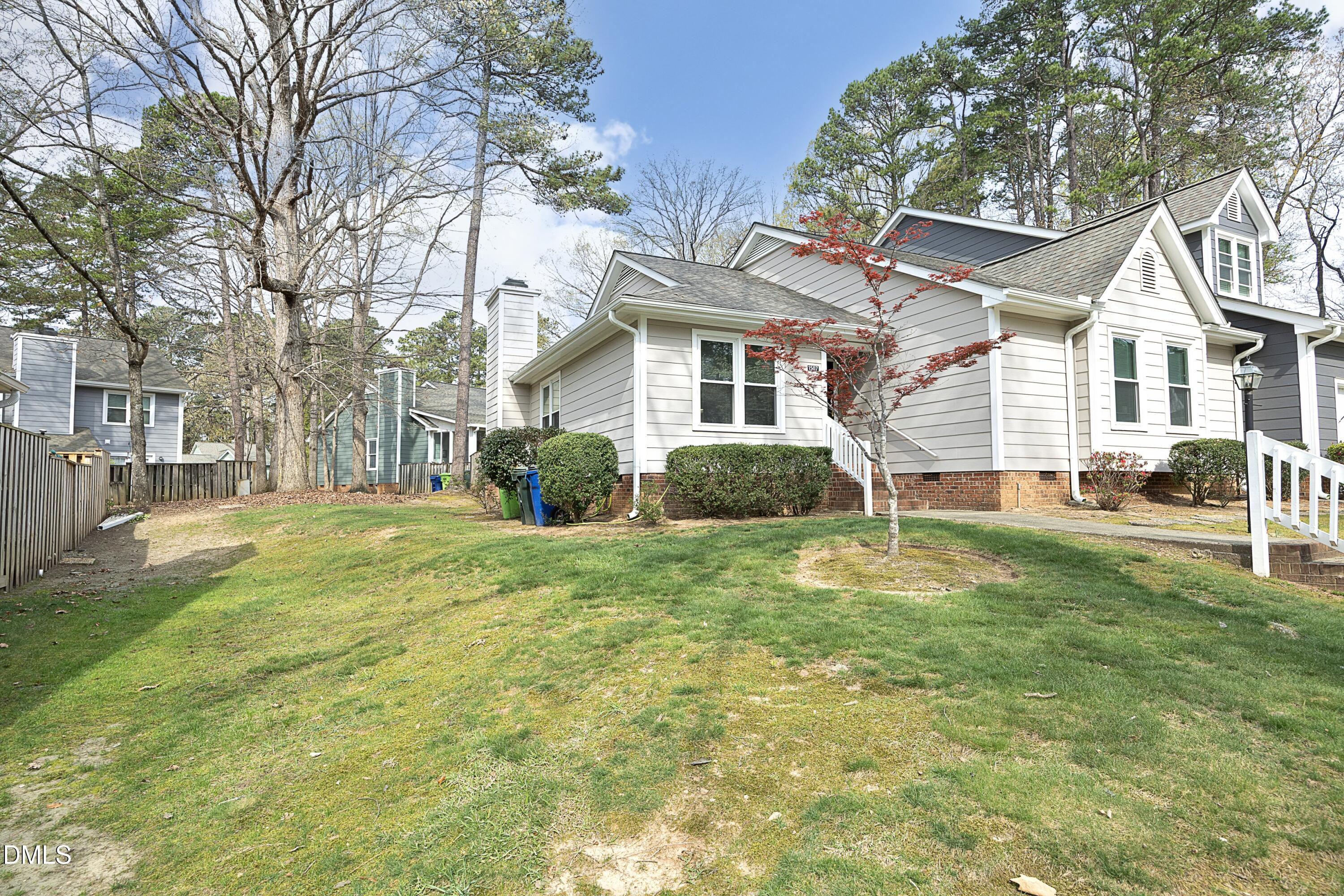 1507 Nature Court Raleigh, NC 27609 - Photo 2 of 30 02FrontWithSideGrass