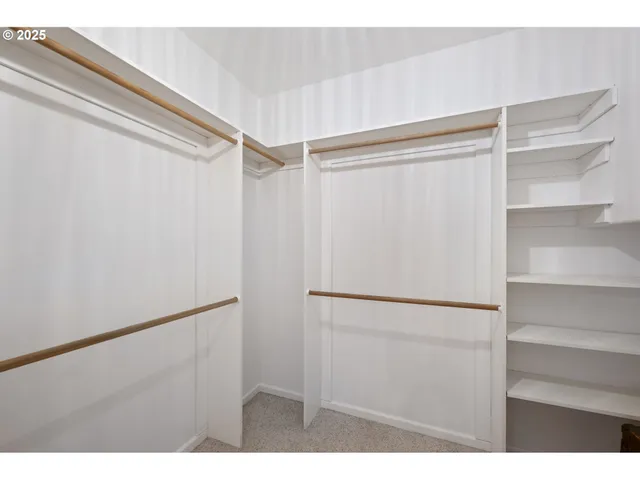 a view of an empty walk in closet