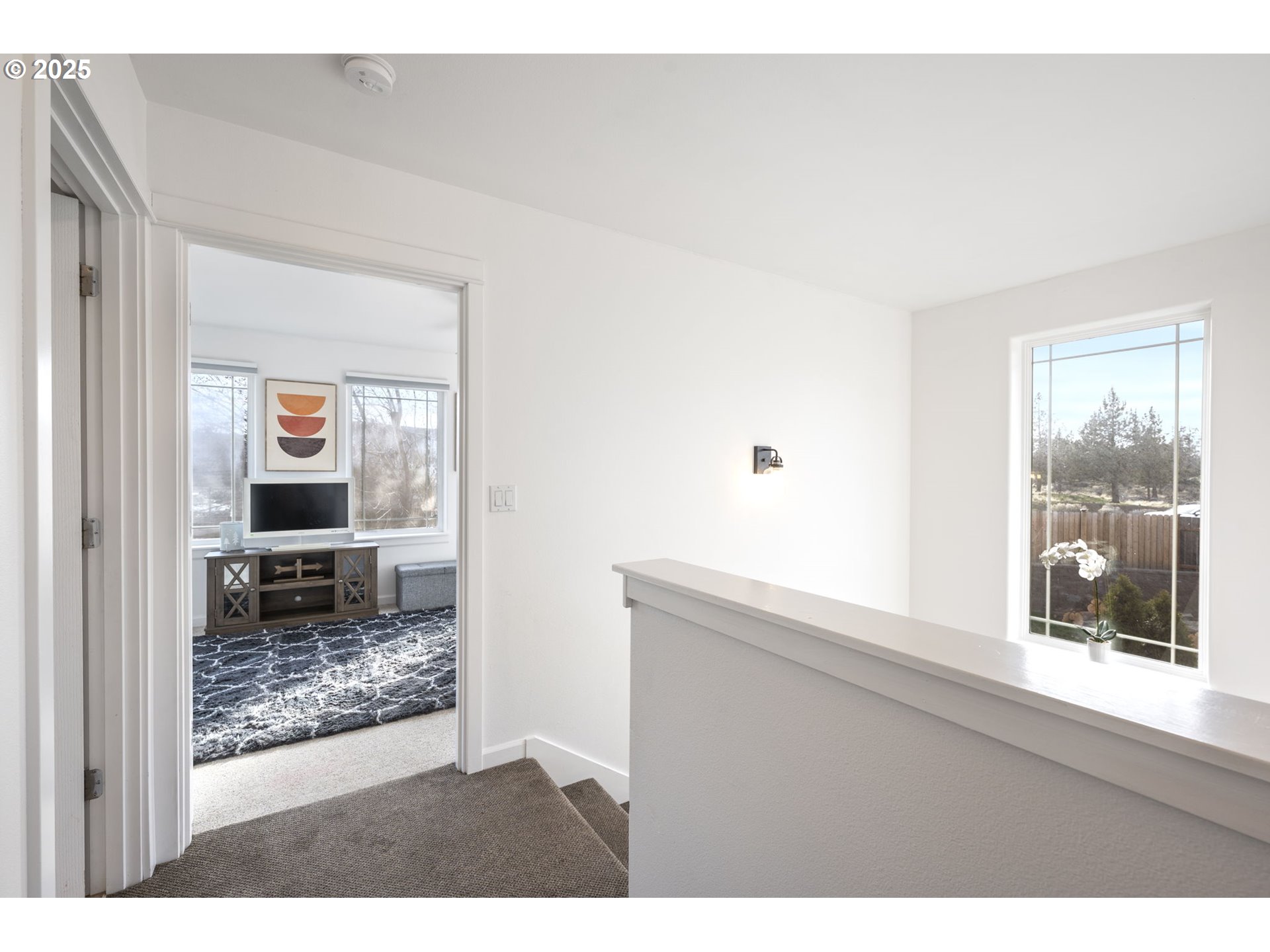 63103 Watercress Way Bend, OR 97701 - Photo 24 of 47 a living room with a couch