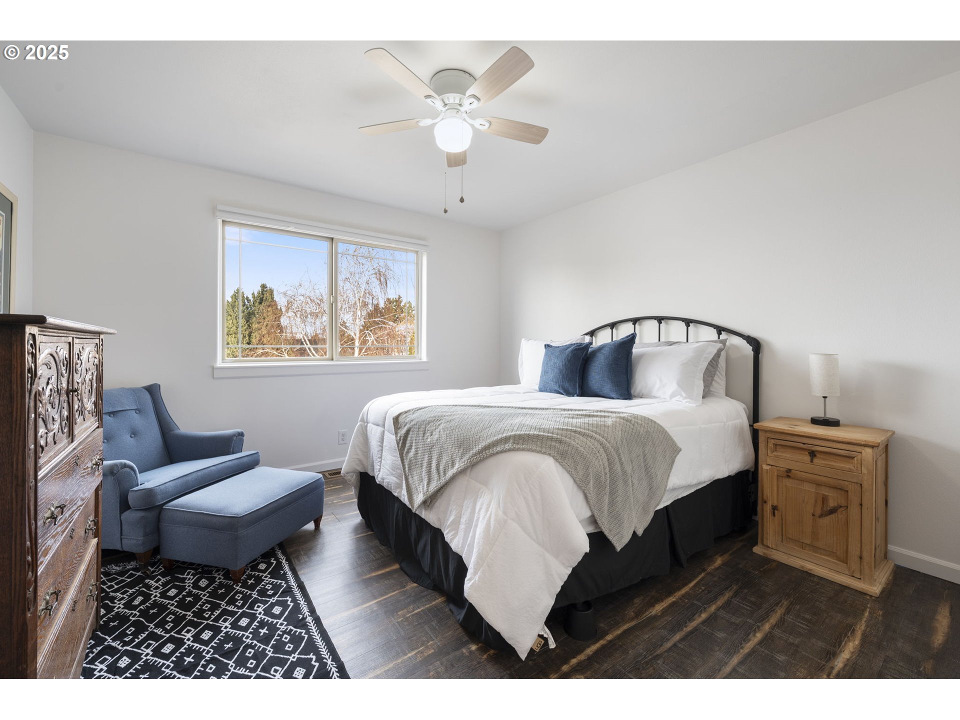 63103 Watercress Way Bend, OR 97701 - Photo 29 of 47 a bedroom with a bed rug and window