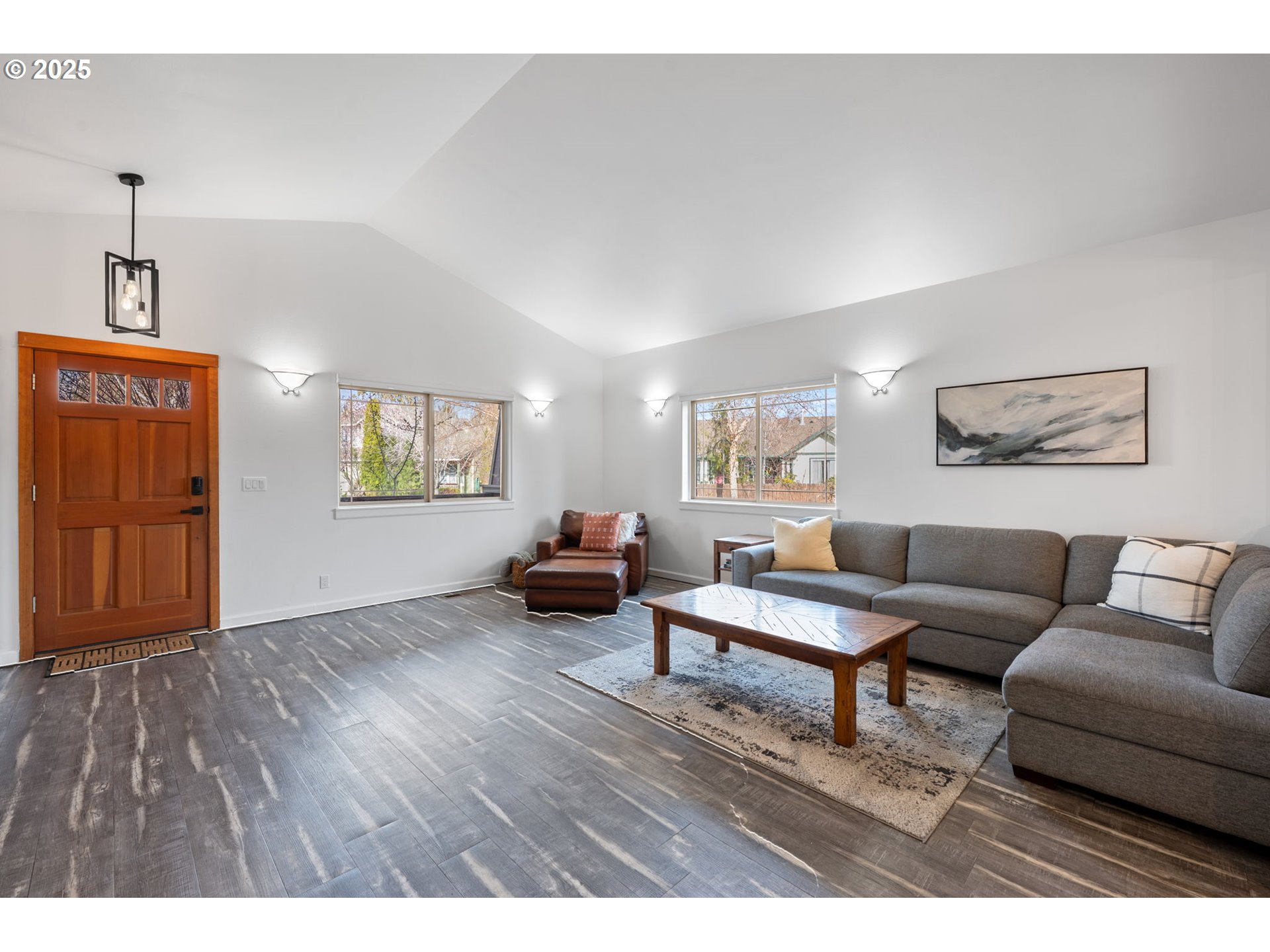 63103 Watercress Way Bend, OR 97701 - Photo 4 of 47 a living room with furniture and a wooden floor