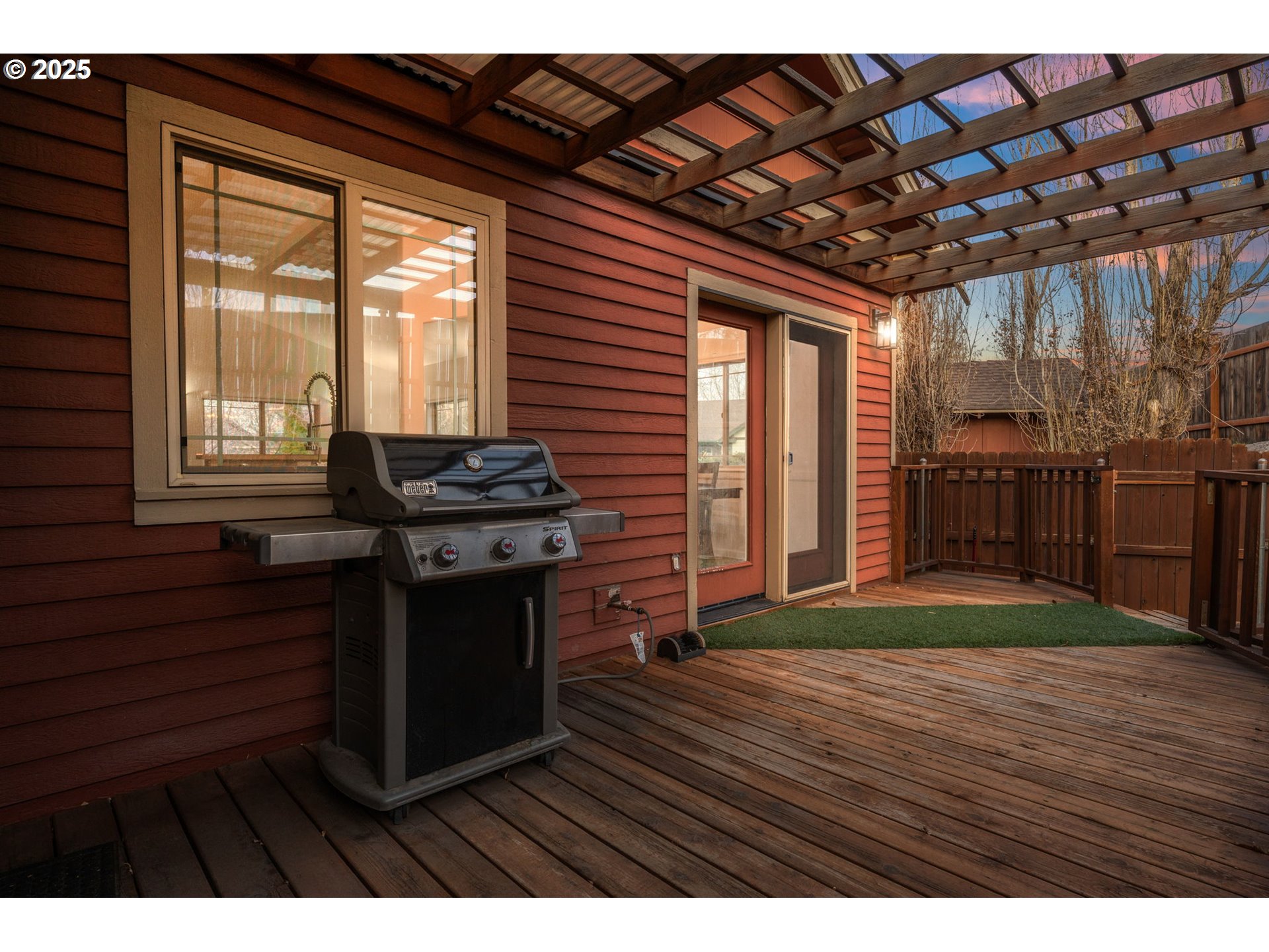 63103 Watercress Way Bend, OR 97701 - Photo 42 of 47 a kitchen with wooden floors and wooden cabinets