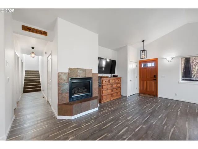 a view of a livingroom with wooden floor