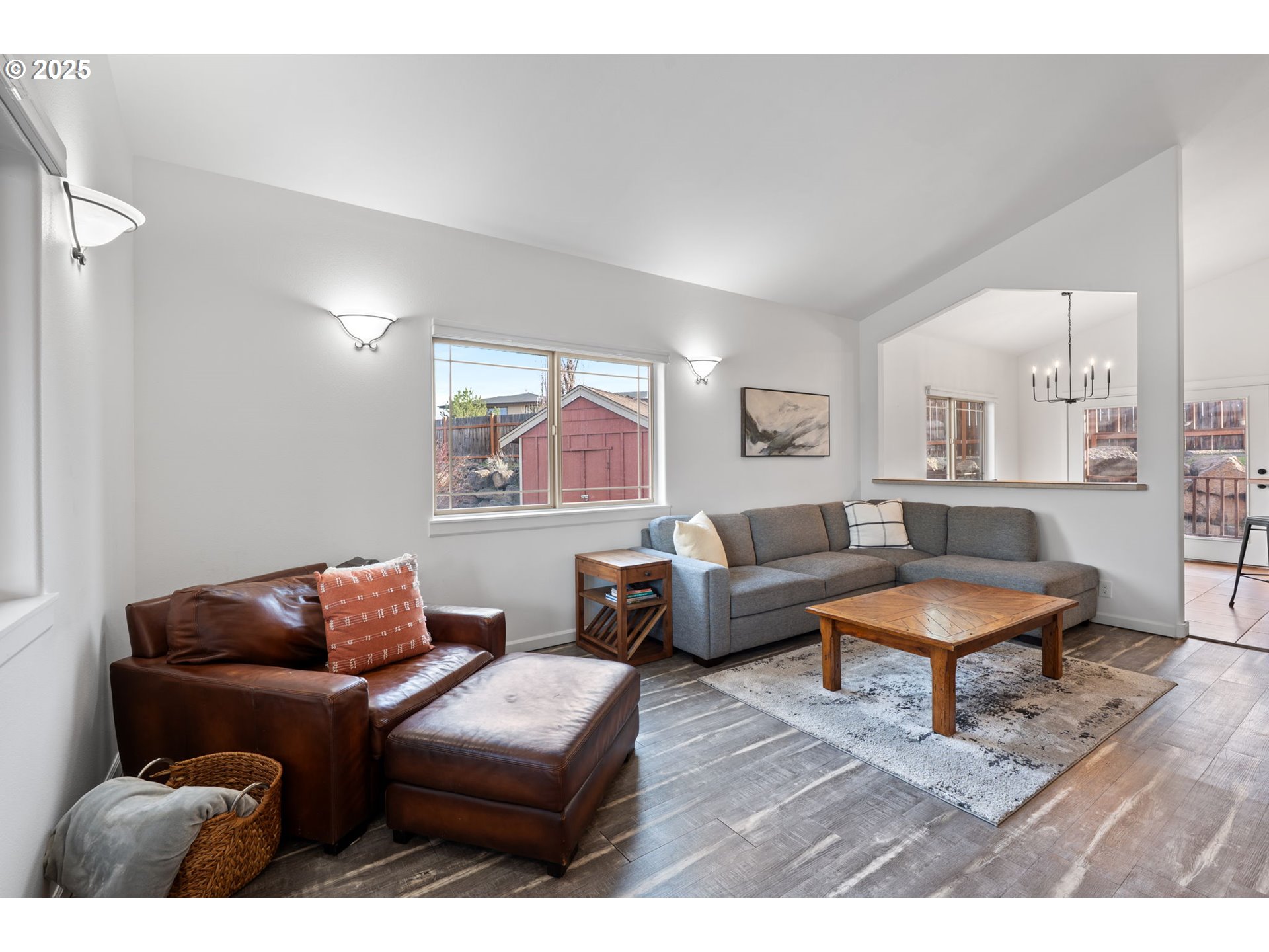 63103 Watercress Way Bend, OR 97701 - Photo 8 of 47 a living room with furniture and wooden floor
