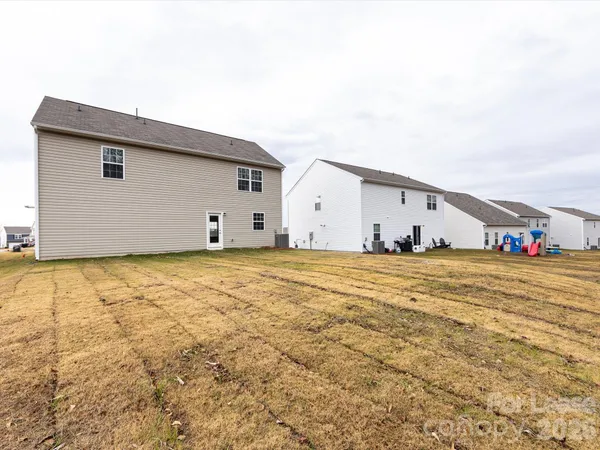 a view of an house with backyard space