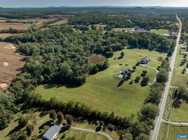 an aerial view of a house with a garden