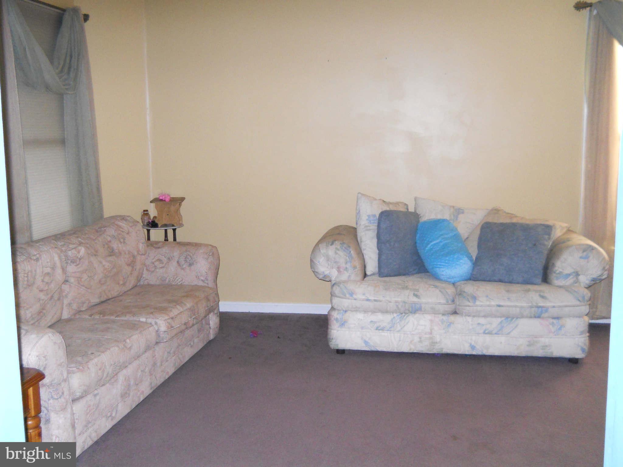 227 Hitching Post Drive Rising Sun, MD 21911 - Photo 2 of 26 a living room with furniture and a couch
