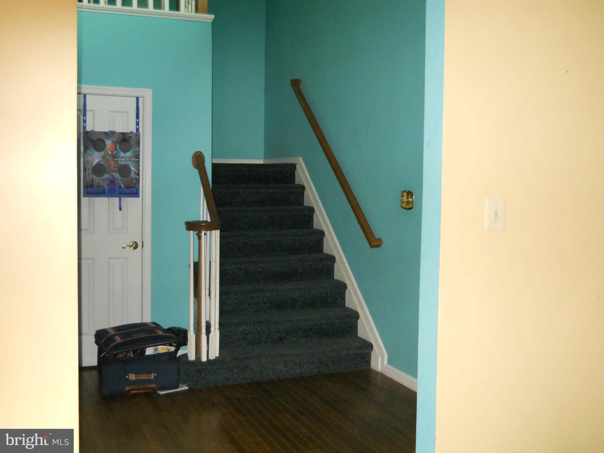 227 Hitching Post Drive Rising Sun, MD 21911 - Photo 3 of 26 a view of entryway and hall with wooden floor