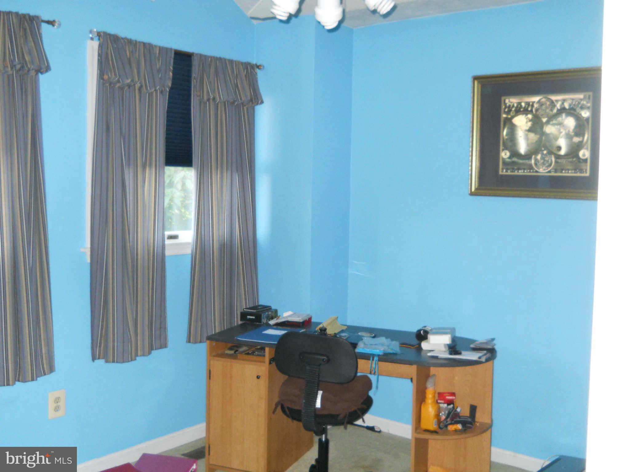 227 Hitching Post Drive Rising Sun, MD 21911 - Photo 22 of 26 a living room with furniture and a window