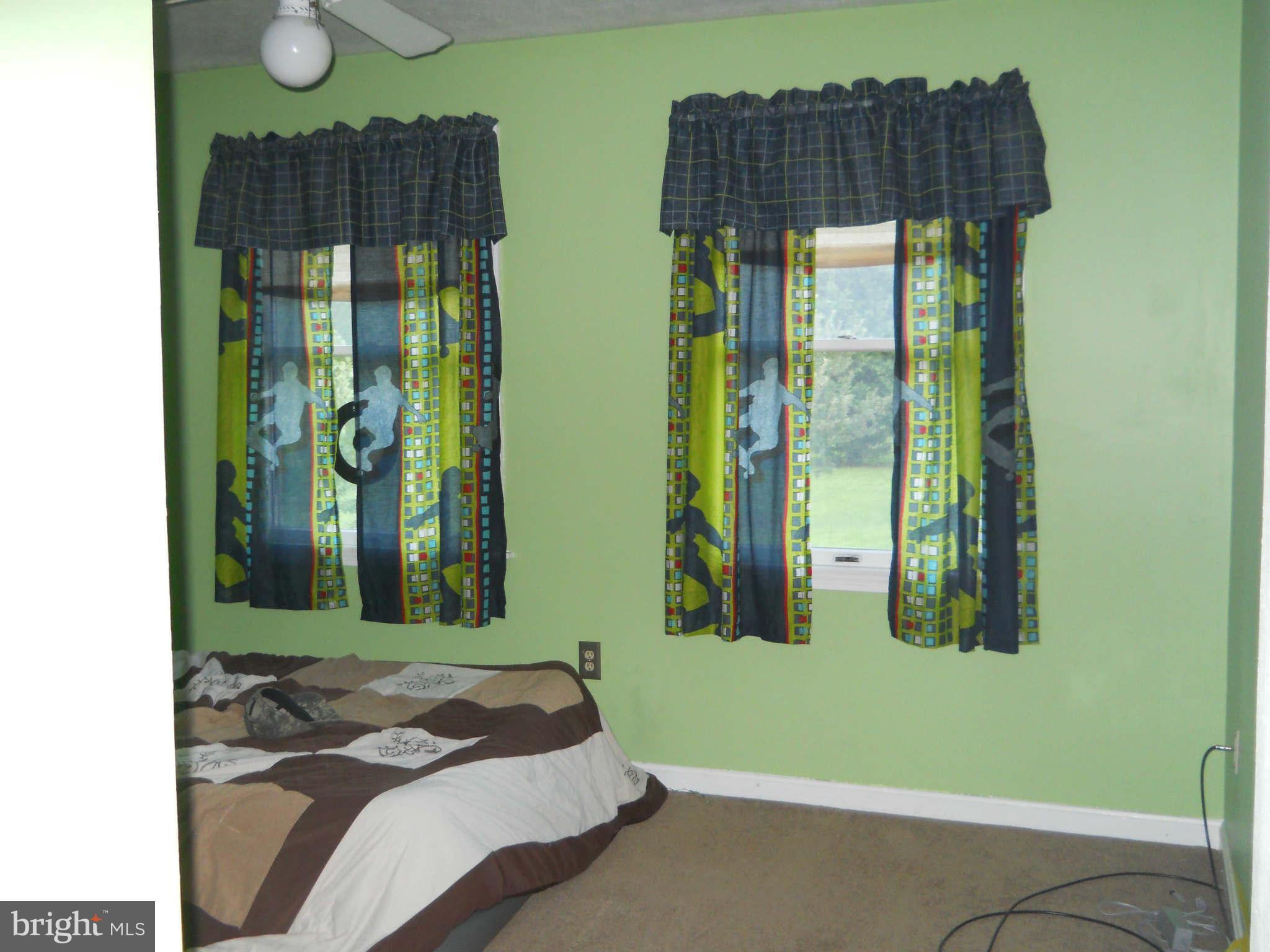 227 Hitching Post Drive Rising Sun, MD 21911 - Photo 24 of 26 a bedroom with bed and a window