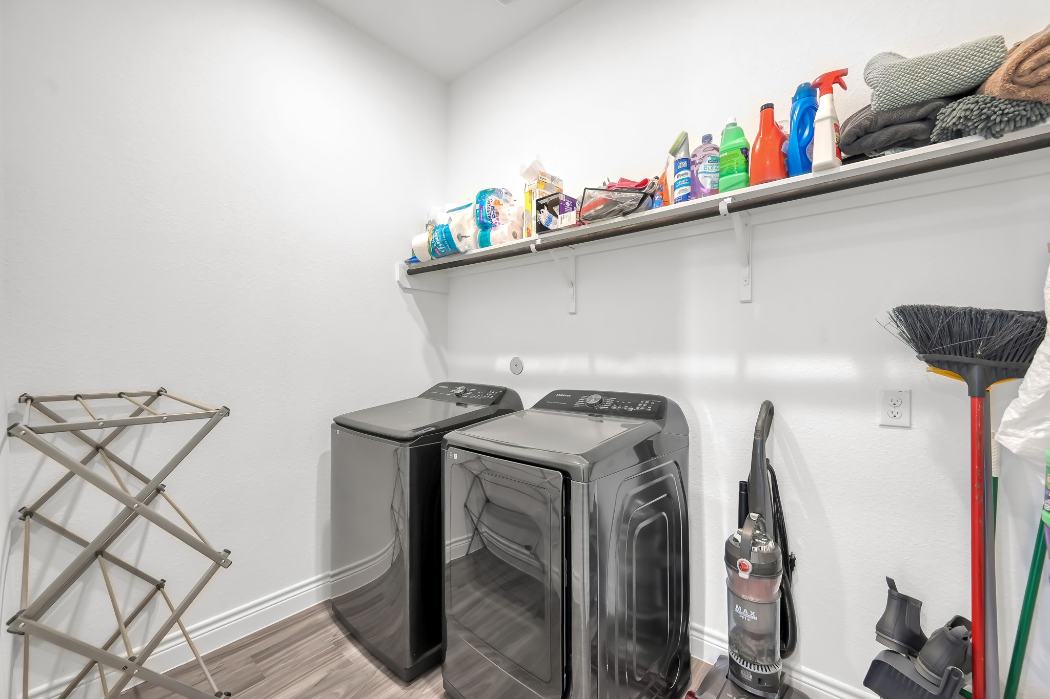 12250 Seagrape Lane Conroe, TX 77304 - Photo 19 of 19 a utility room with dryer and washer