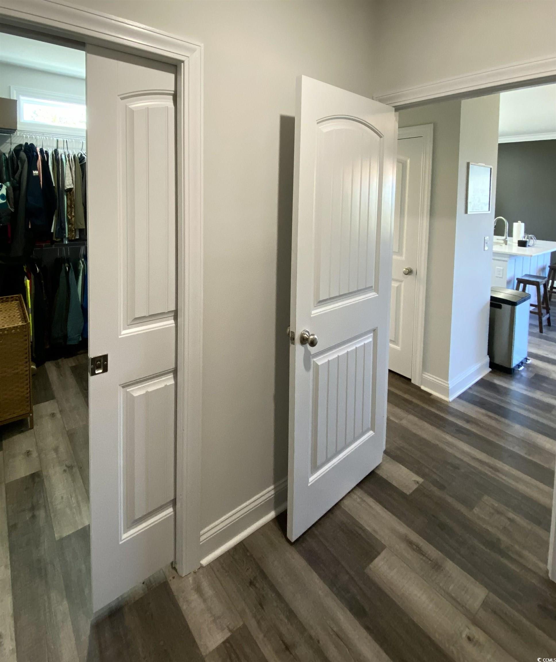 2664 Seaport Circle Georgetown, SC 29440 - Photo 22 of 40 Corridor with dark wood-style flooring