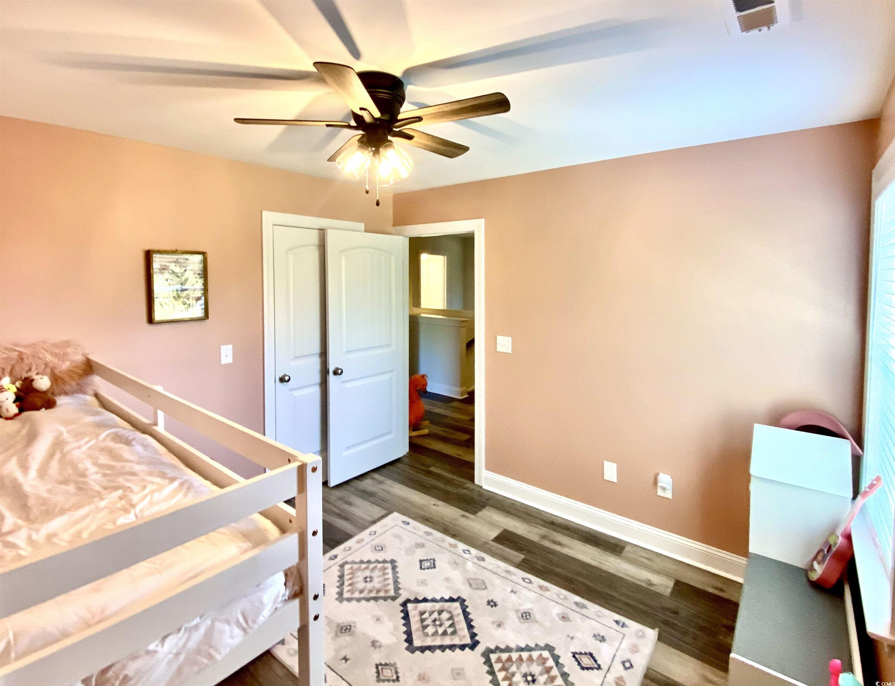 2664 Seaport Circle Georgetown, SC 29440 - Photo 30 of 40 Bedroom featuring wood finished floors and ceiling fan