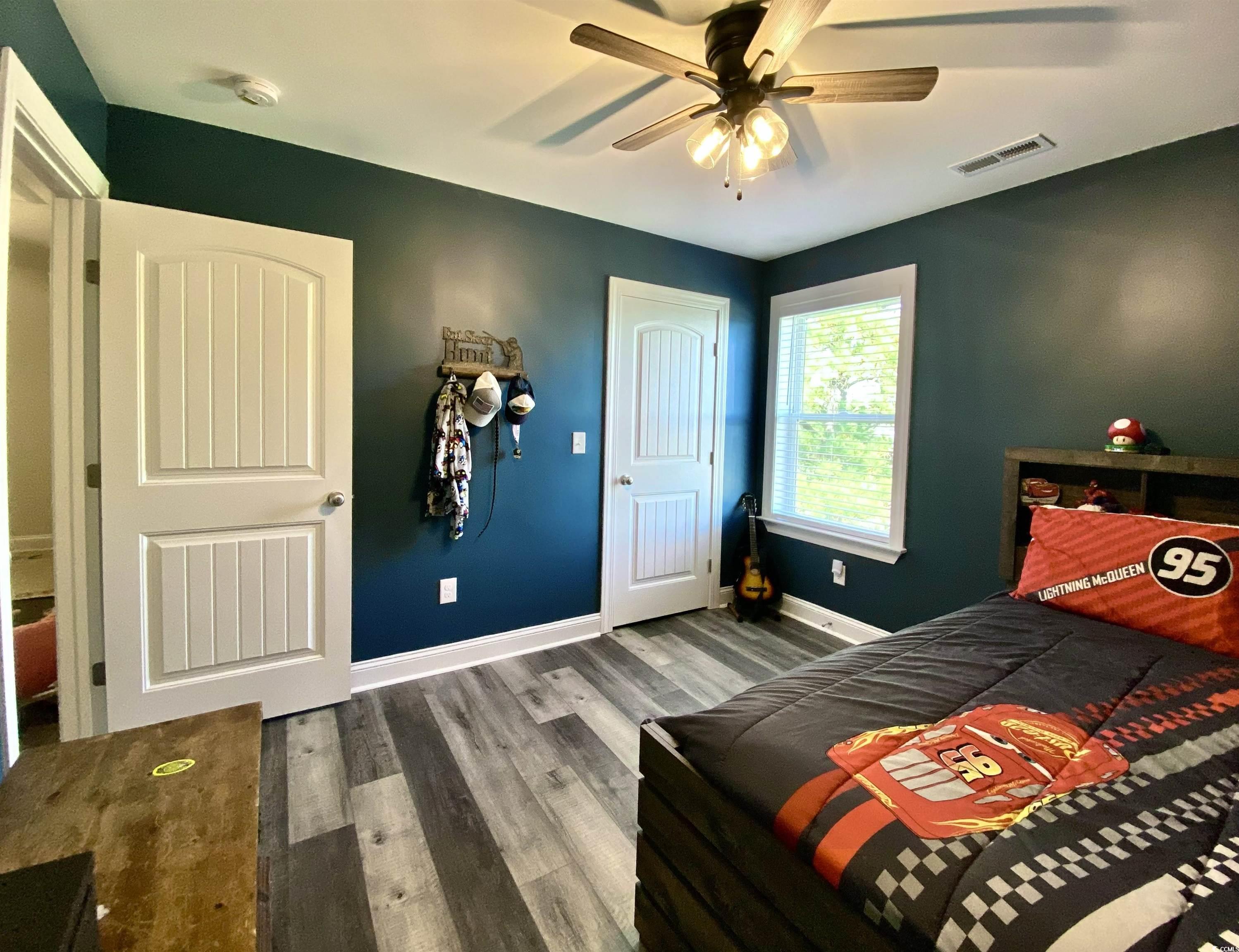2664 Seaport Circle Georgetown, SC 29440 - Photo 31 of 40 Bedroom with wood finished floors and ceiling fan
