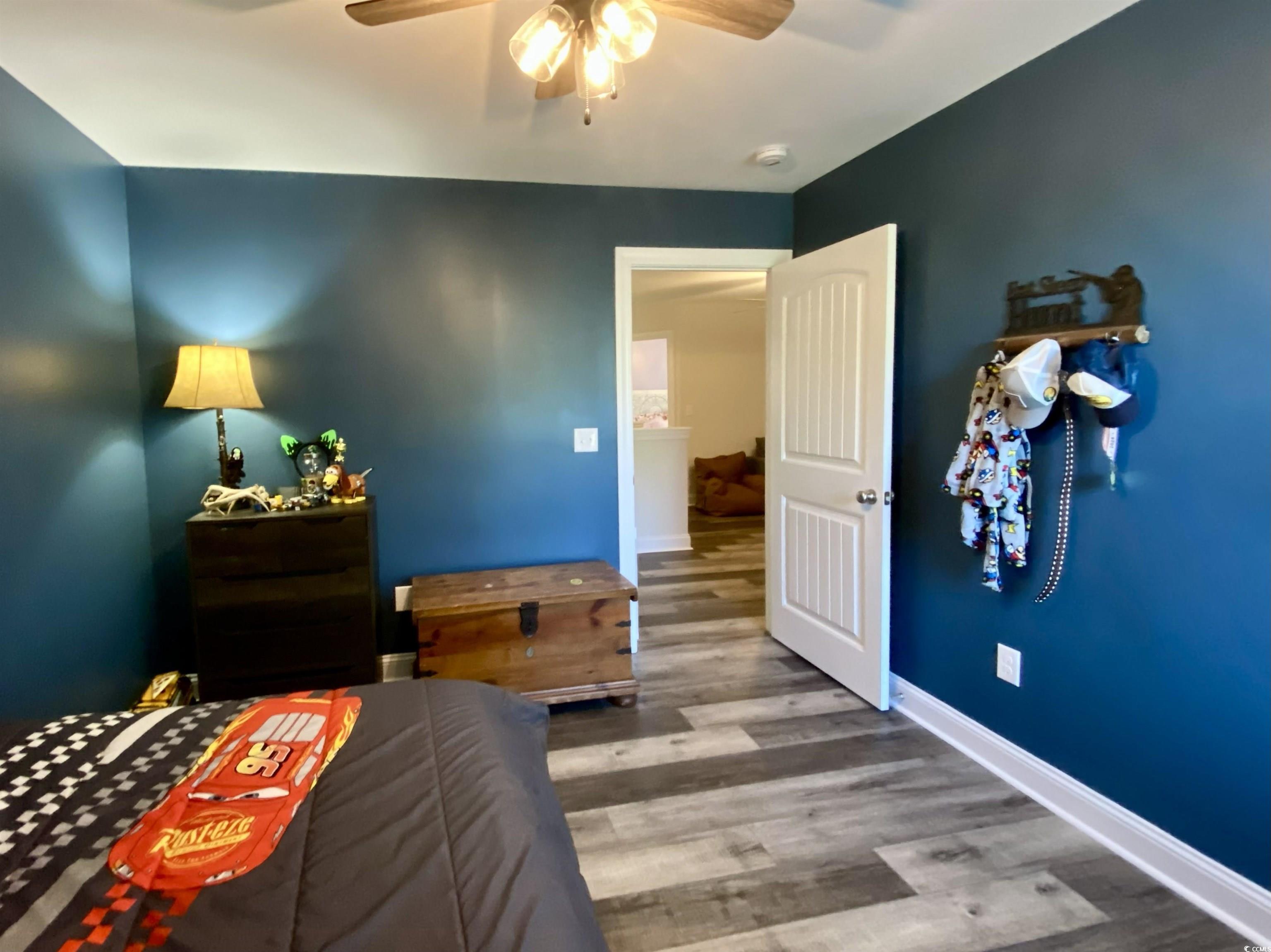 2664 Seaport Circle Georgetown, SC 29440 - Photo 32 of 40 Bedroom with wood finished floors and ceiling fan