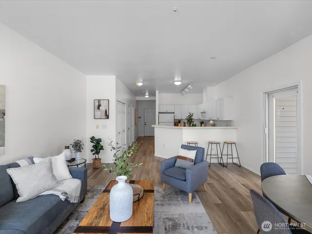 a bedroom with a bed and a couch