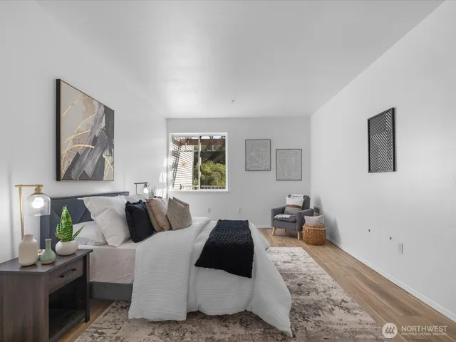 a bathroom with a double vanity sink a mirror and a shower