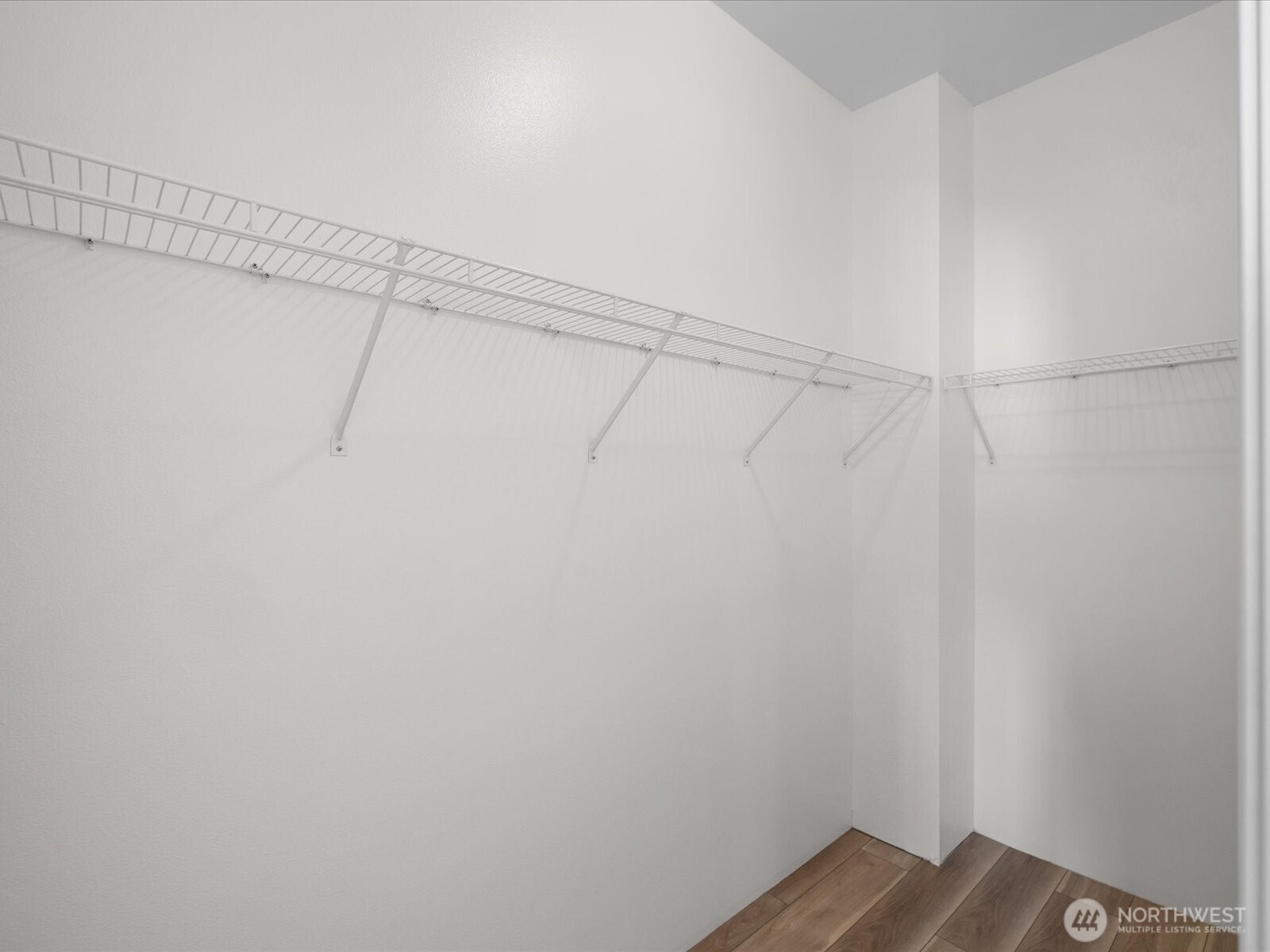 17426 Bothell Way Northeast, Unit A407 Bothell, WA 98011 - Photo 19 of 36 a view of a room with racks on the wall