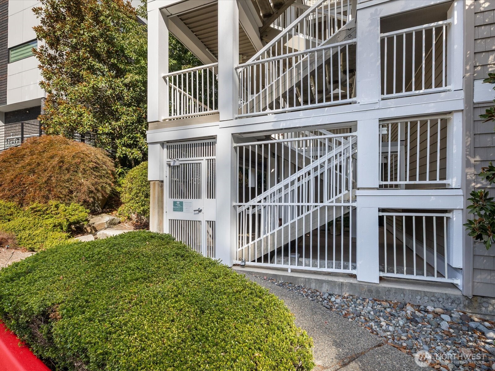 17426 Bothell Way Northeast, Unit A407 Bothell, WA 98011 - Photo 29 of 36 an outdoor view of a house with a fence