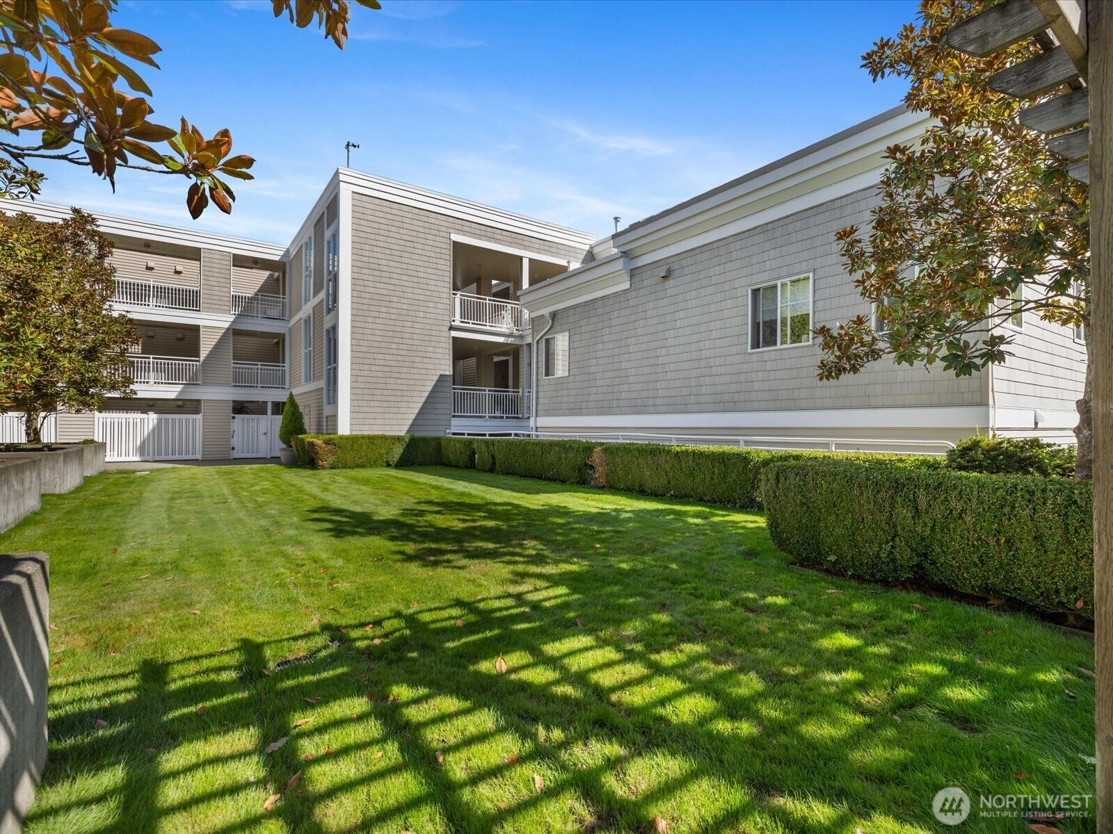 17426 Bothell Way Northeast, Unit A407 Bothell, WA 98011 - Photo 33 of 36 a house view with a garden space
