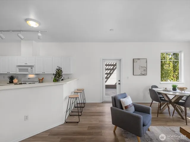 a dining room with furniture and a fireplace